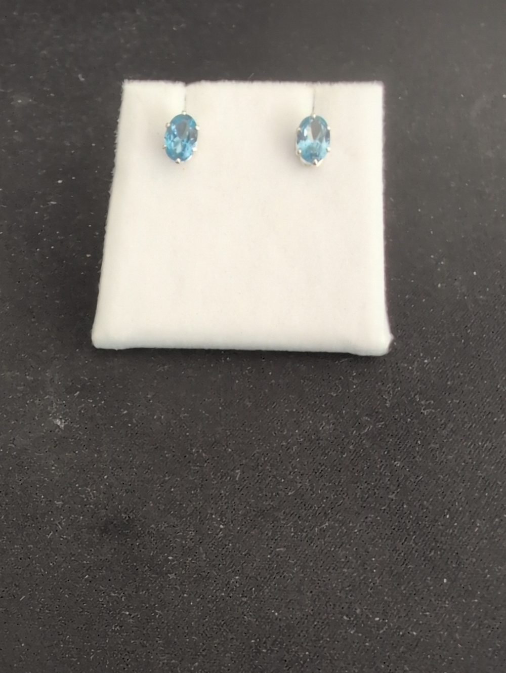 Blue Oval Gemstone Stud Earrings In a Silver tone setting